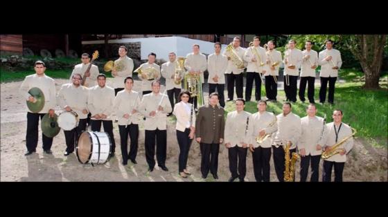 Evento musical Estreno de “Canto a Puntarenas” de Fredy Calvo Chaves - Banda de Conciertos de Guanacaste músicos con uniformes e instrumentos