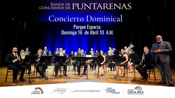 Foto de la Banda en escenario de un teatro