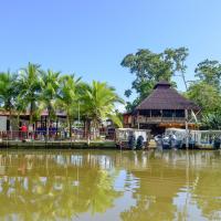 Imagen el muelle de tortuguero, el poblado y río Tortuguero