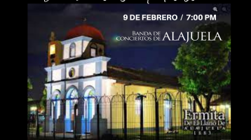 Foto de la fachada de la Ermita del Llano con luces de colores