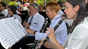 Foto de la sección de clarinetes de la Banda tocando en el Museo Nacional
