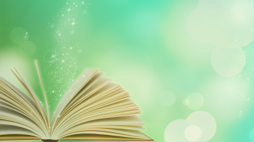 Libro abierto con polvos mágicos
